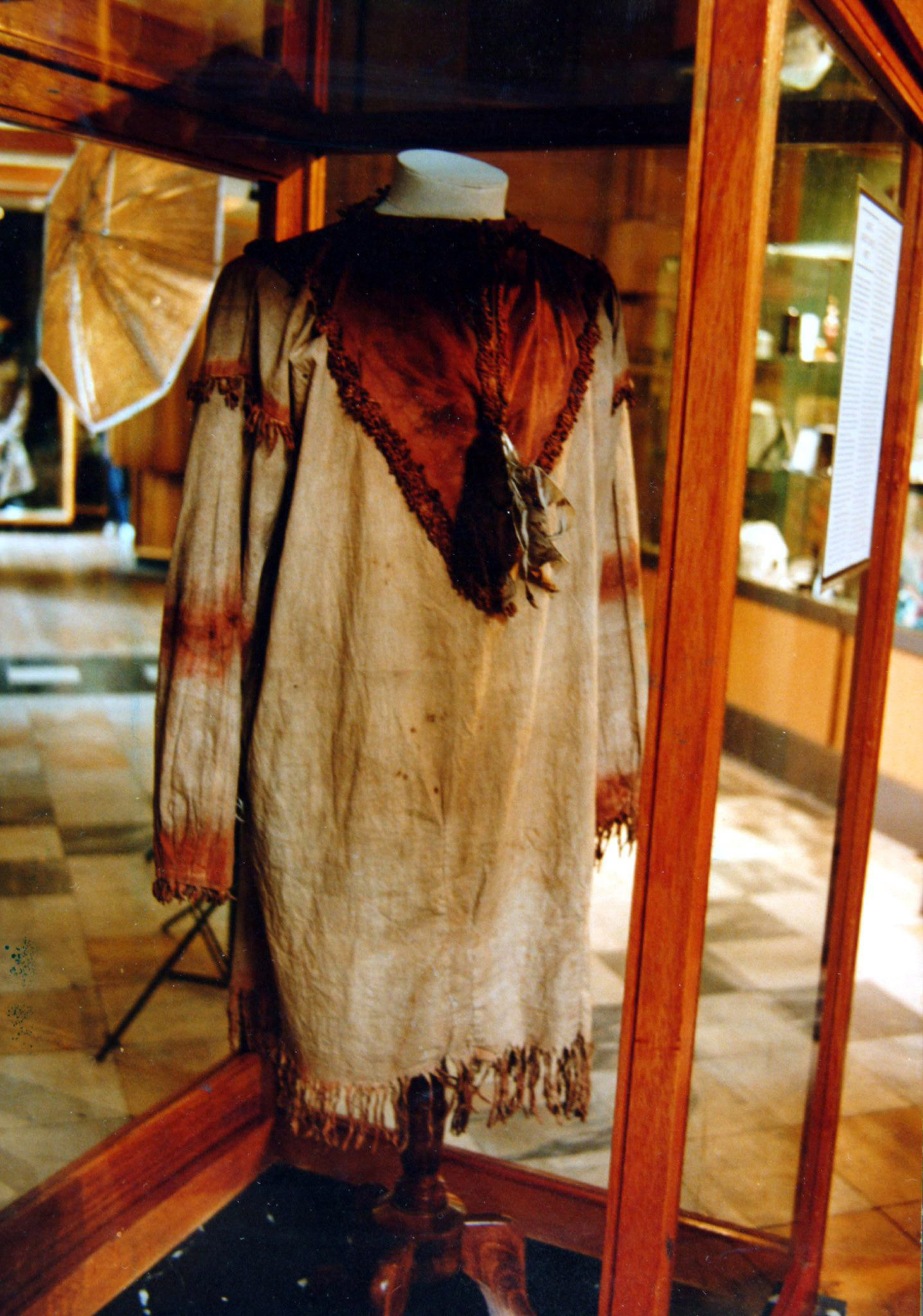 The Indian Ghost Shirt behind glass at Kelvingrove Art Gallery. It returned to the US in 2000.