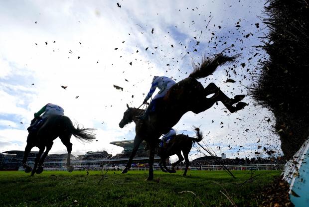 HeraldScotland: Runners and riders in action as they compete in the Close Brothers Red Rum Handicap Chase at Aintree Racecourse, Liverpool. Credit: PA