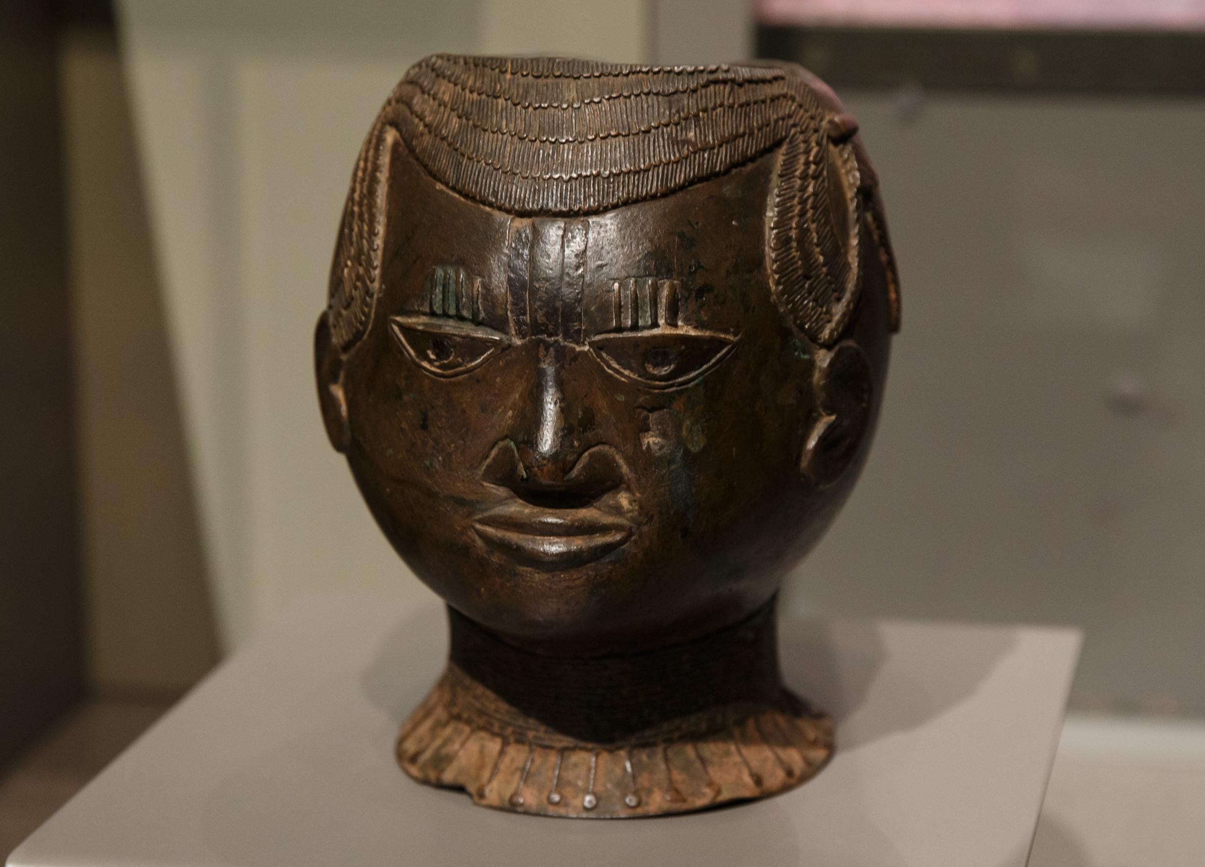 Benin Bronze display at Kelvingrove Art Gallery and Museum.17 Benin bronzes will be repriated to Nigeria, some of which are currently on display at Kelvingrove. Pictured is a head dating from 1502-1602. Photograph by Colin Mearns.