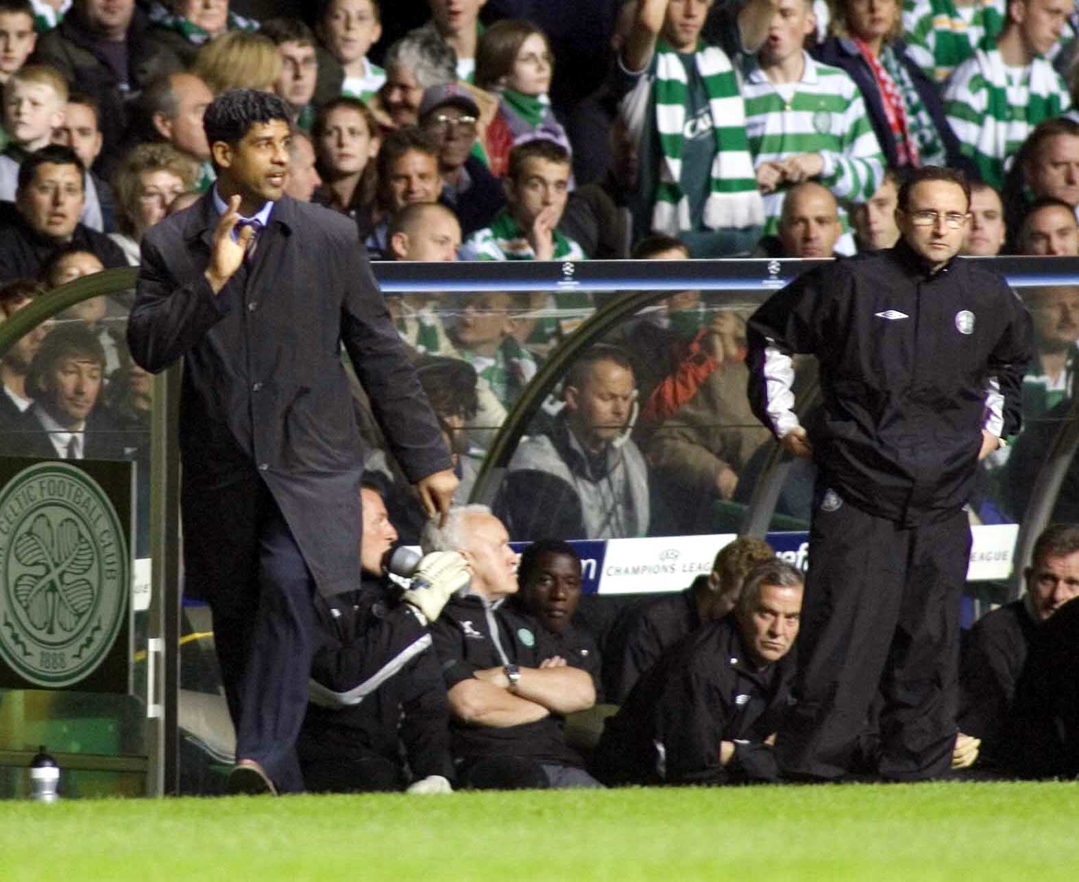 14/09/04 CHAMPIONS LEAGUE CELTIC v BARCELONA (1-3) CELTIC PARK - GLASGOW Barcelona manager Frank Rijkaard (left) and his Celtic counterpart Martin ONeill study the game unfolding.