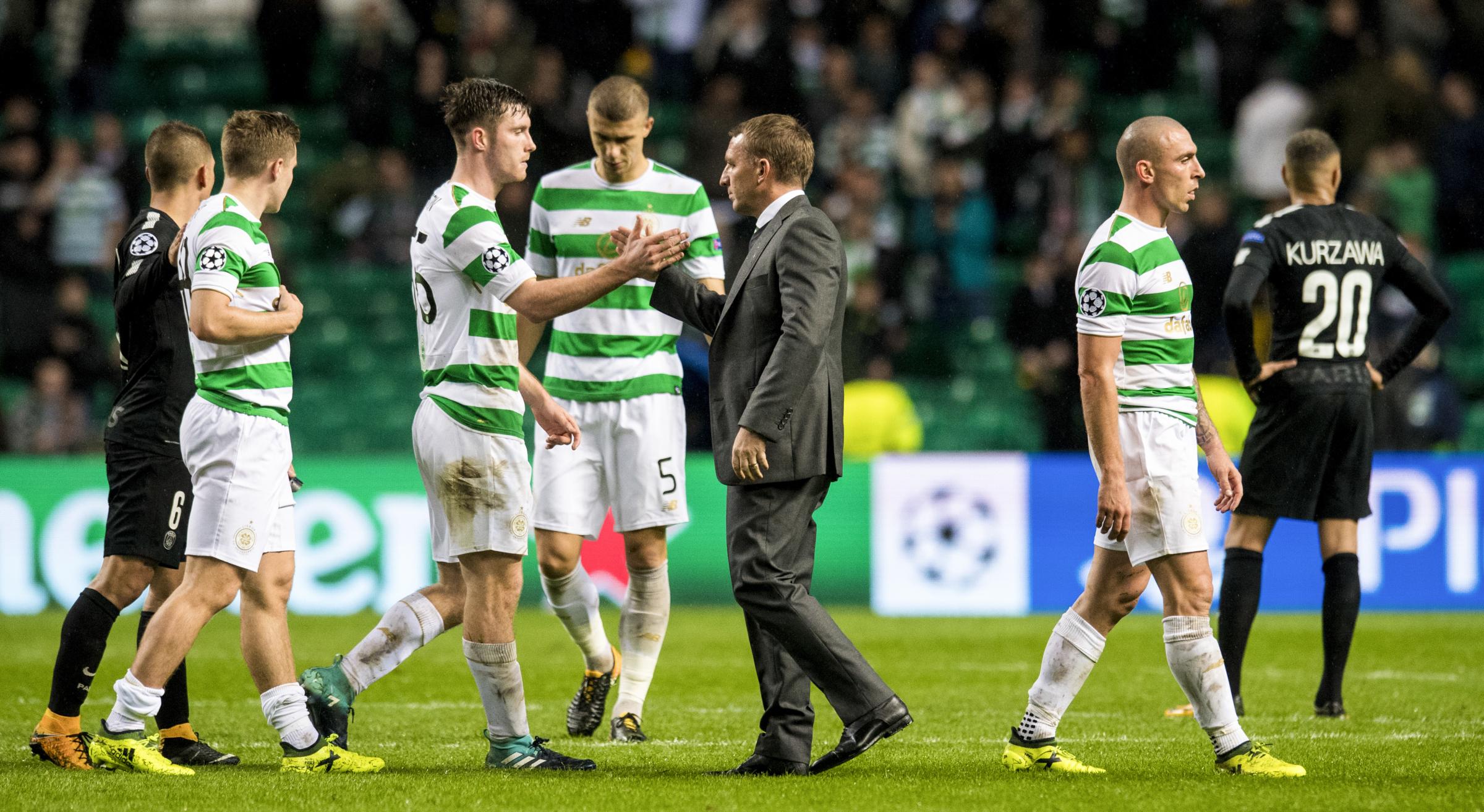 12/09/17 UEFA CHAMPIONS LEAGUE GROUP STAGE CELTIC v PSG CELTIC PARK - GLASGOW Celtic manager Brendan Rodgers (centre) with Anthony Ralston at full-time