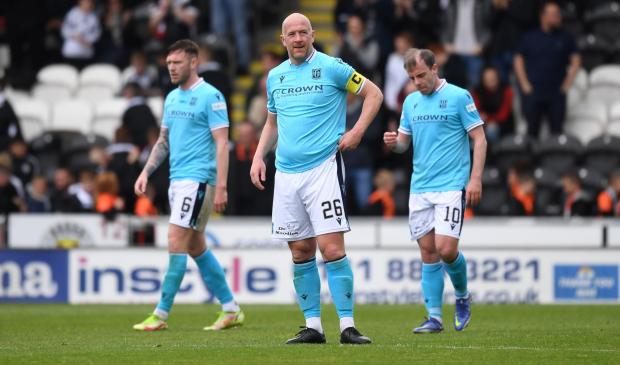 HeraldScotland: Charlie Adam endured a difficult day with his Dundee teammates on Saturday 