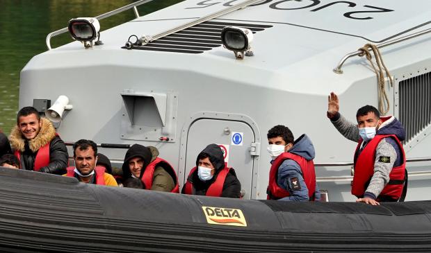 HeraldScotland: Migrants being brought over to Dover in Kent (PA)