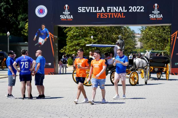 Rangers fans at the Plaza de Espana in Seville ahead of Wednesday's UEFA Europa League Final between Eintracht Frankfurt and Rangers. (Images: PA)