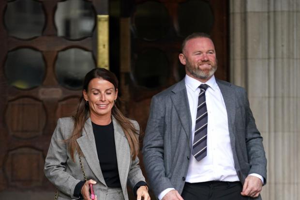 Coleen and Wayne Rooney leaving the Royal Courts Of Justice, London, as the high-profile libel battle between Rebekah Vardy and Coleen Rooney continues. Picture date: Monday May 16, 2022. PA Photo. Rooney accused Vardy of leaking 