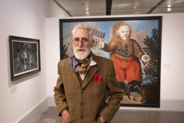 John Patrick Byrne, next to The American Boy (1971). A new exhibition charting his career is set to open at Kelvingrove Art Gallery and Museum