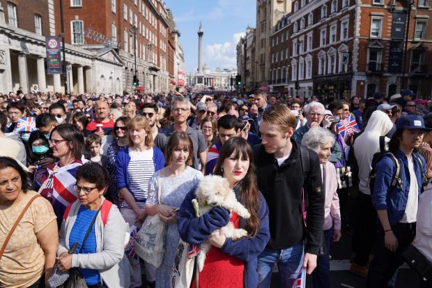 HeraldScotland: Contrasting scenes in London where crowds are gathering for celebrations
