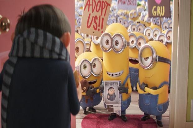 Undated film still handout from Minions: The Rise of Gru. Pictured: Gru (voiced by Steve Carell) and (centre) Kevin (voiced by Pierre Coffin). See PA Feature SHOWBIZ Film Minions. Picture credit should read: PA Photo/Â© 2021 Universal Studios.