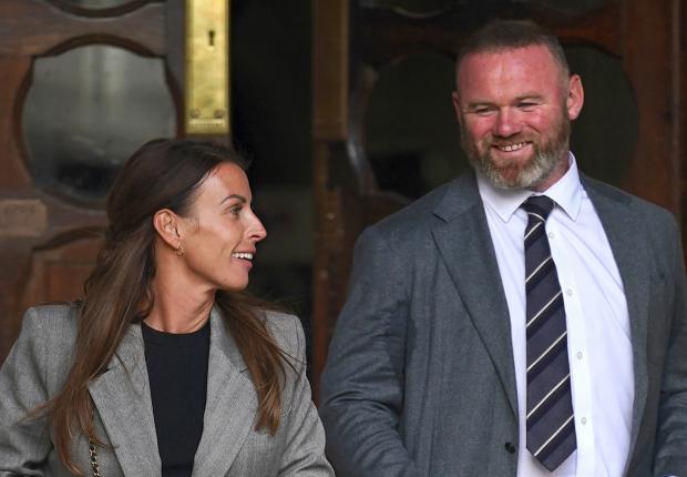 HeraldScotland: Coleen and Wayne Rooney leaving the Royal Courts Of Justice, London in May (PA)