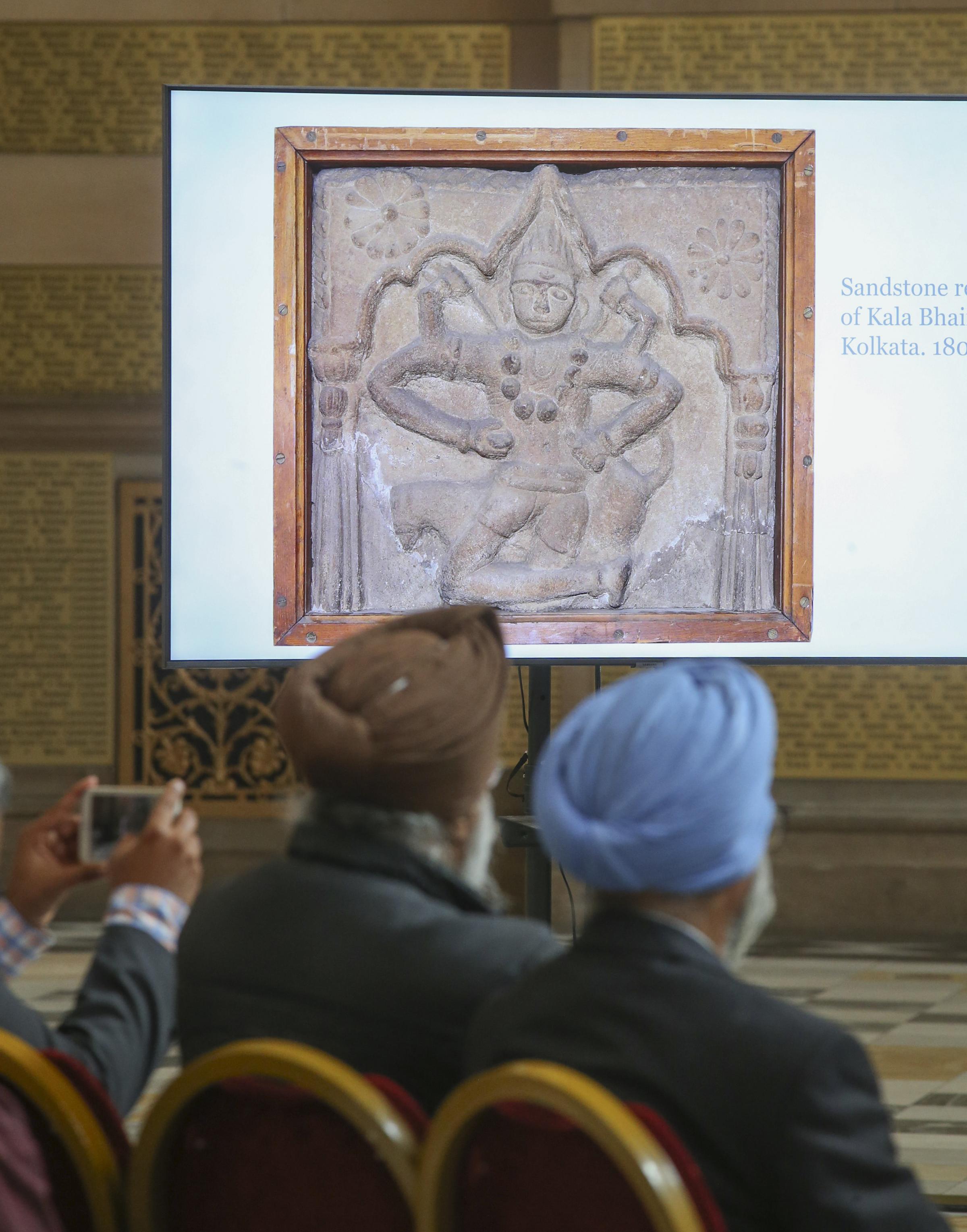 A signing ceremony at Kelvingrove Art Gallery to mark the return of seven Indian antiquities from the city collection. Photo by Gordon Terris.