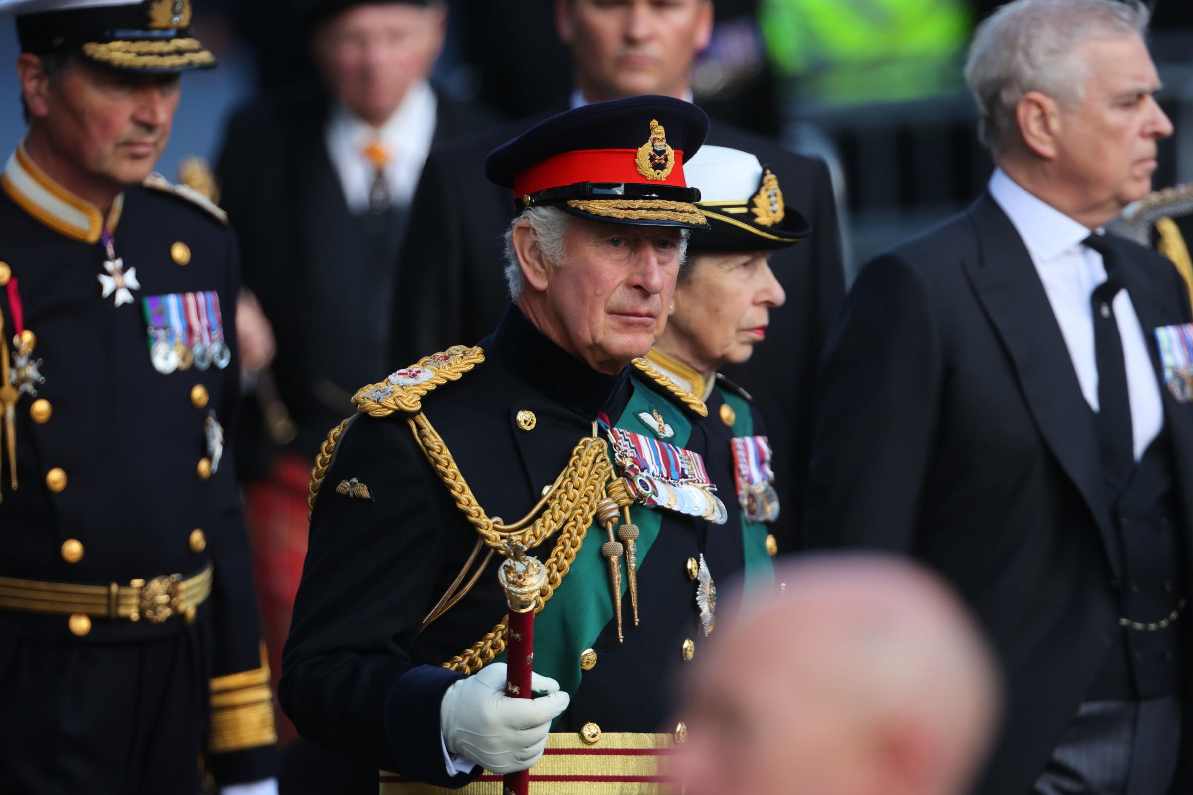 (left to right) Vice Admiral Timothy Laurence, King Charles III, the Princess Royal and the Duke of York join the procession of Queen Elizabeths coffin from the Palace of Holyroodhouse to St Giles Cathedral, Edinburgh for a Service of Prayer and