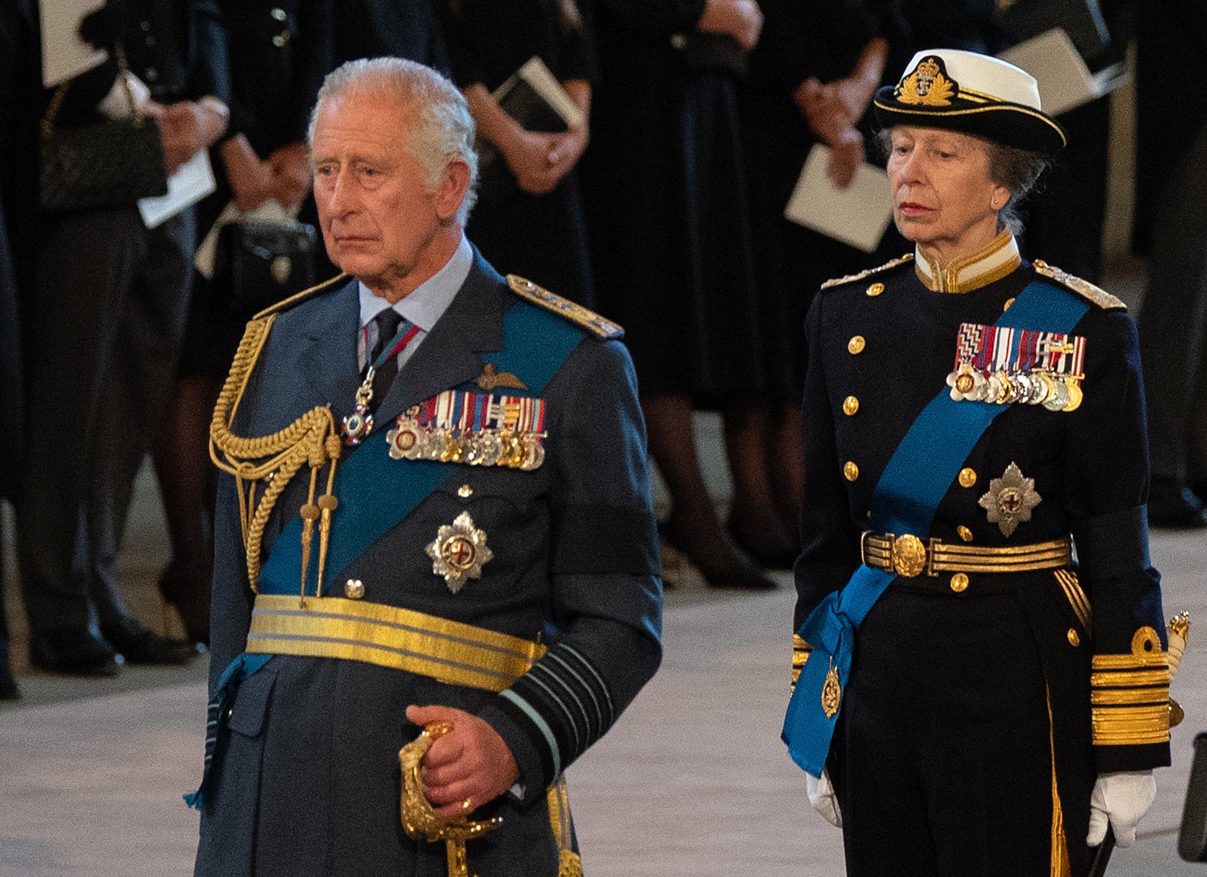 King Charles III and the Princess Royal in front of the coffin of Queen Elizabeth as it lies on the catafalque in Westminster Hall, London, where it will lie in state ahead of her funeral on Monday. Photo credit: David Ramos/PA Wire.