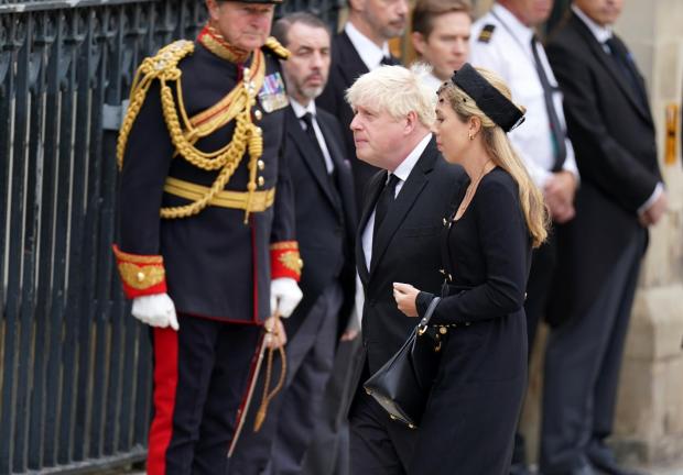 HeraldScotland: Former Prime Minister Boris Johnson and wife Carrie arrives for the State Funeral of Queen Elizabeth II, held at Westminster Abbey, London.