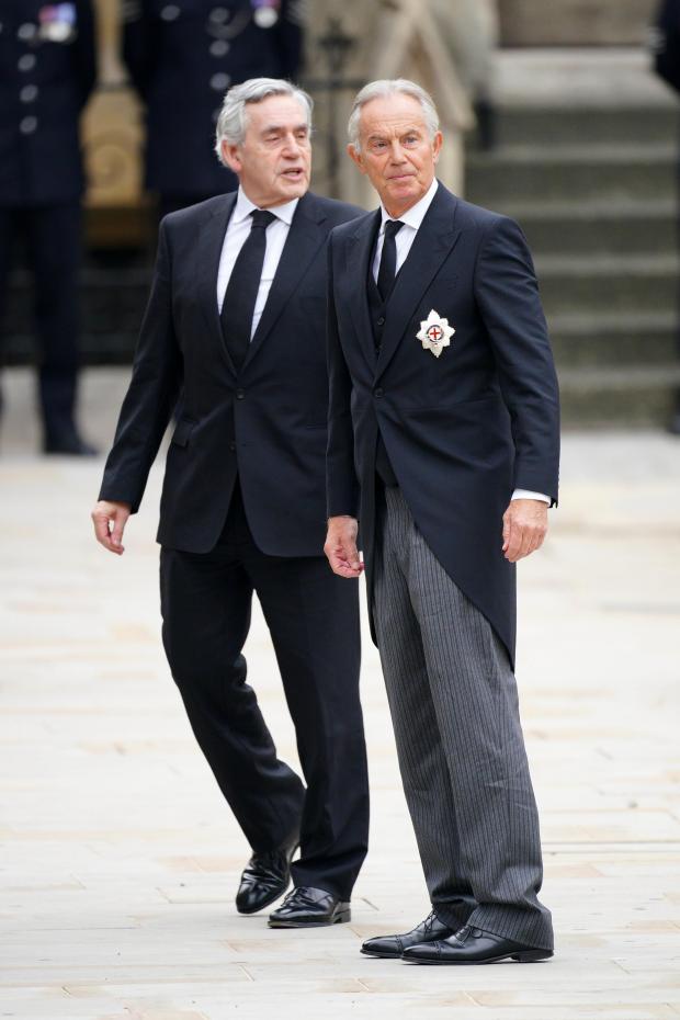 HeraldScotland: Former prime ministers Tony Blair (right) and Gordon Brown arriving at the State Funeral of Queen Elizabeth II, held at Westminster Abbey, London