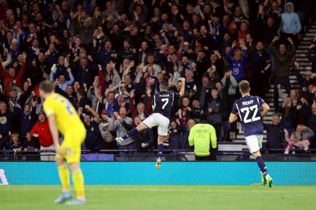 Scotland's John McGinn celebrates scoring their side's first goal of the game during the UEFA Nations League match at Hampden Park.