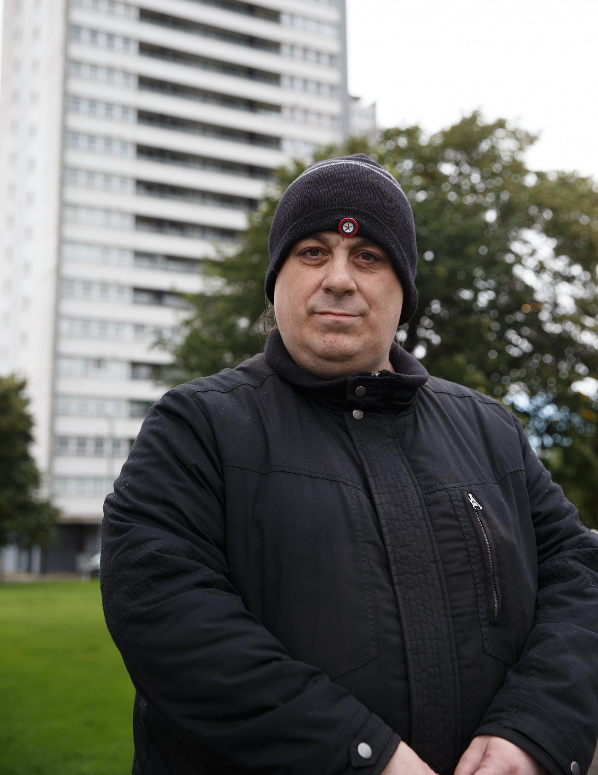 Resident William Doolan pictured at the tower blocks at The Wyndford, Maryhill, Glasgow. Photograph by Colin Mearns.
