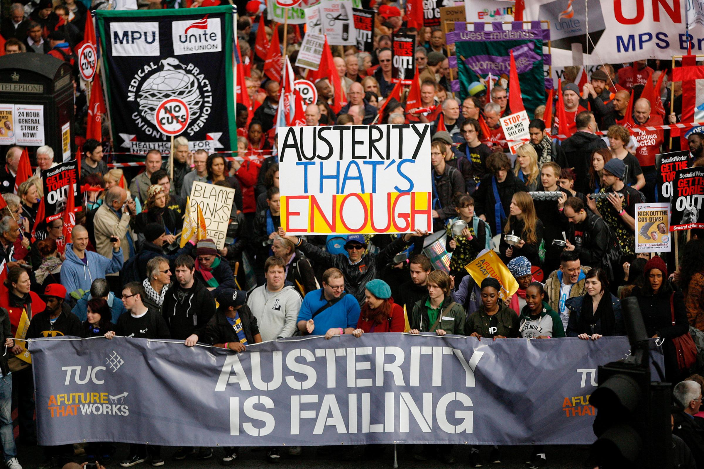 LONDON, UNITED KINGDOM - OCTOBER 20: Demonstrators take part in a TUC march in protest against the governments austerity measures on October 20, 2012 in London, England. Thousands of people are taking part in the Trades Union Congress (TUC) organised