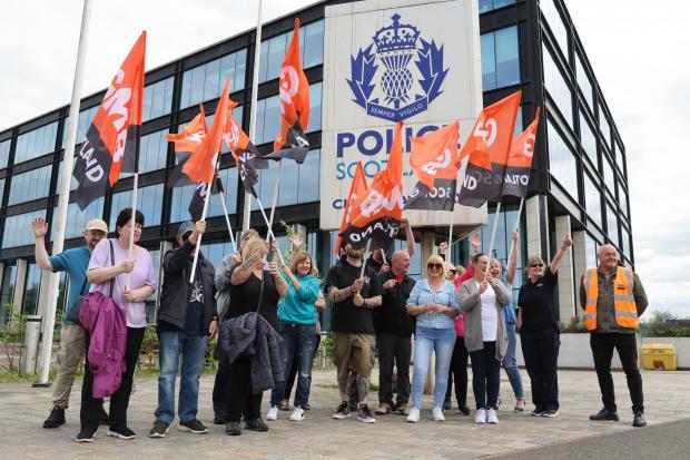 Cleansing and janitorial staff protest outside of the Police Scotland building on French Street in Glasgow