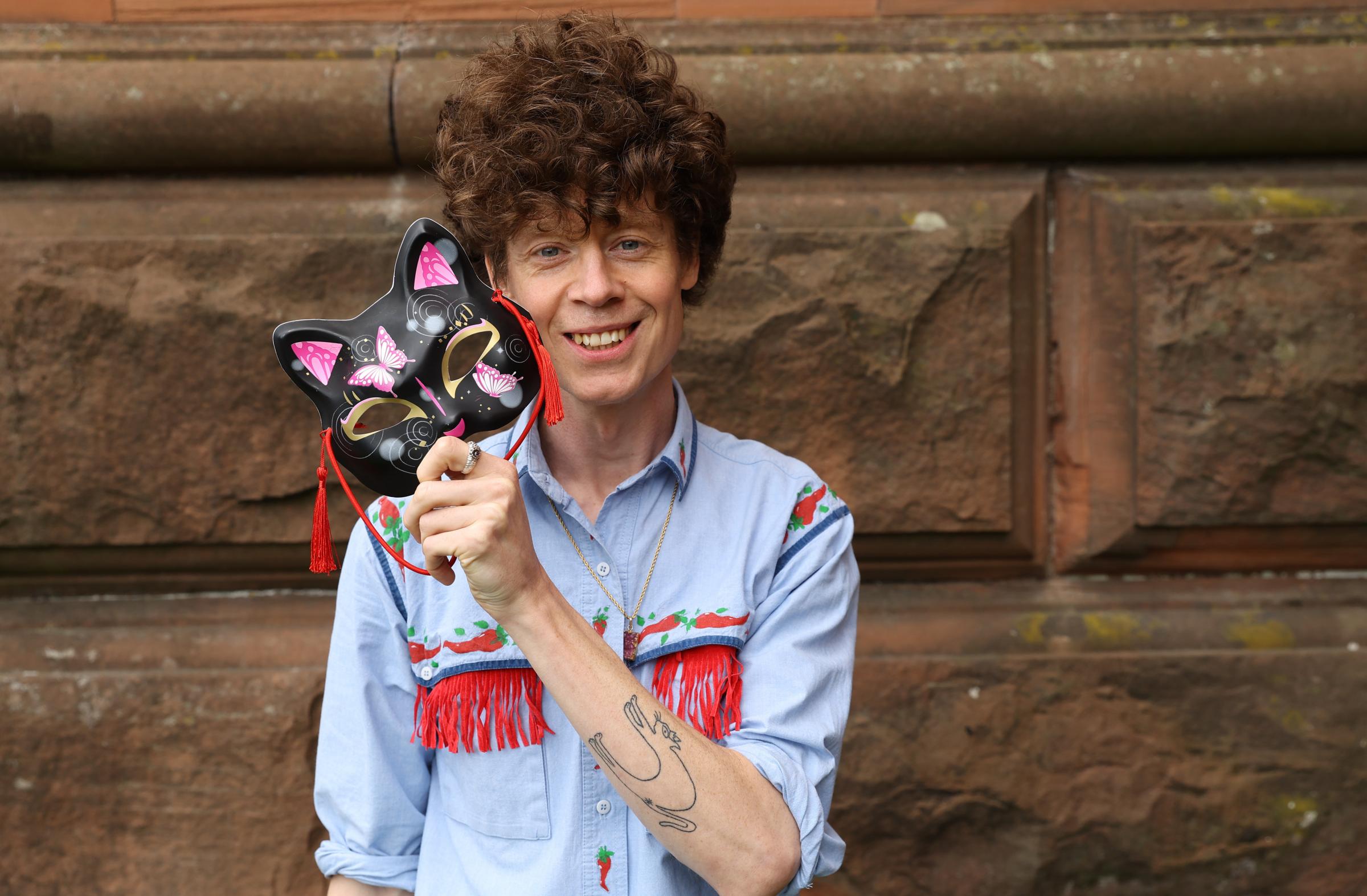 The writer Michael Pedersen pictured in Glasgow with a cat mask. Michaels collection of poems, The Cat Prince has just been published. The title poem from the his new collection of poems, The Cat Prince is about metamorphosing into a cat. Michael