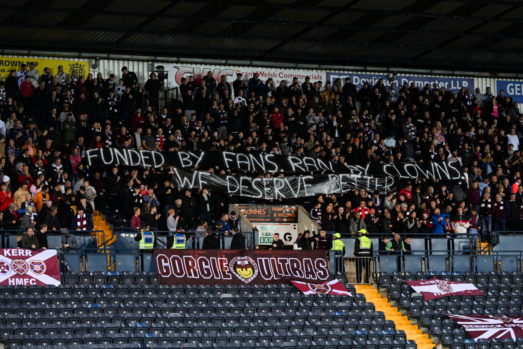 Hearts fans' banners 'not helping' Steven Naismith cause