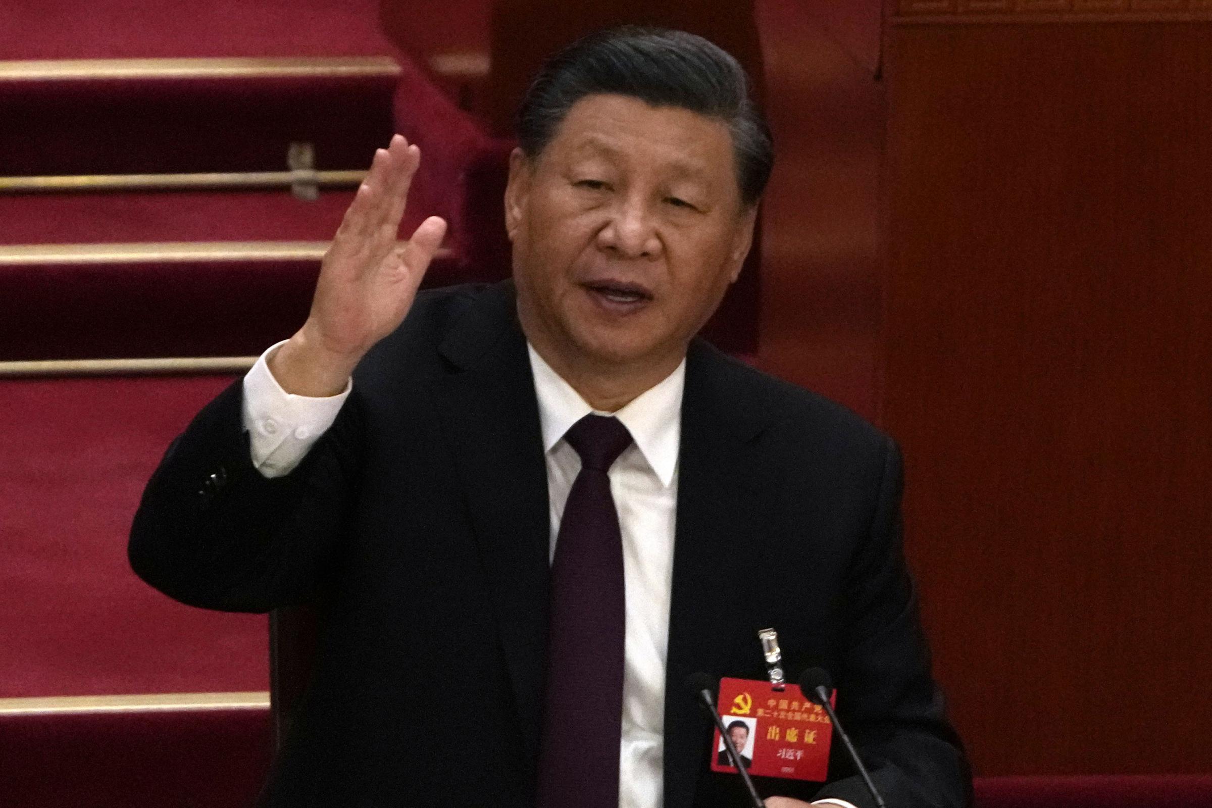 Chinese President Xi Jinping attends the closing ceremony of the 20th National Congress of Chinas ruling Communist Party at the Great Hall of the People in Beijing, Saturday, Oct. 22, 2022. (AP Photo/Ng Han Guan).