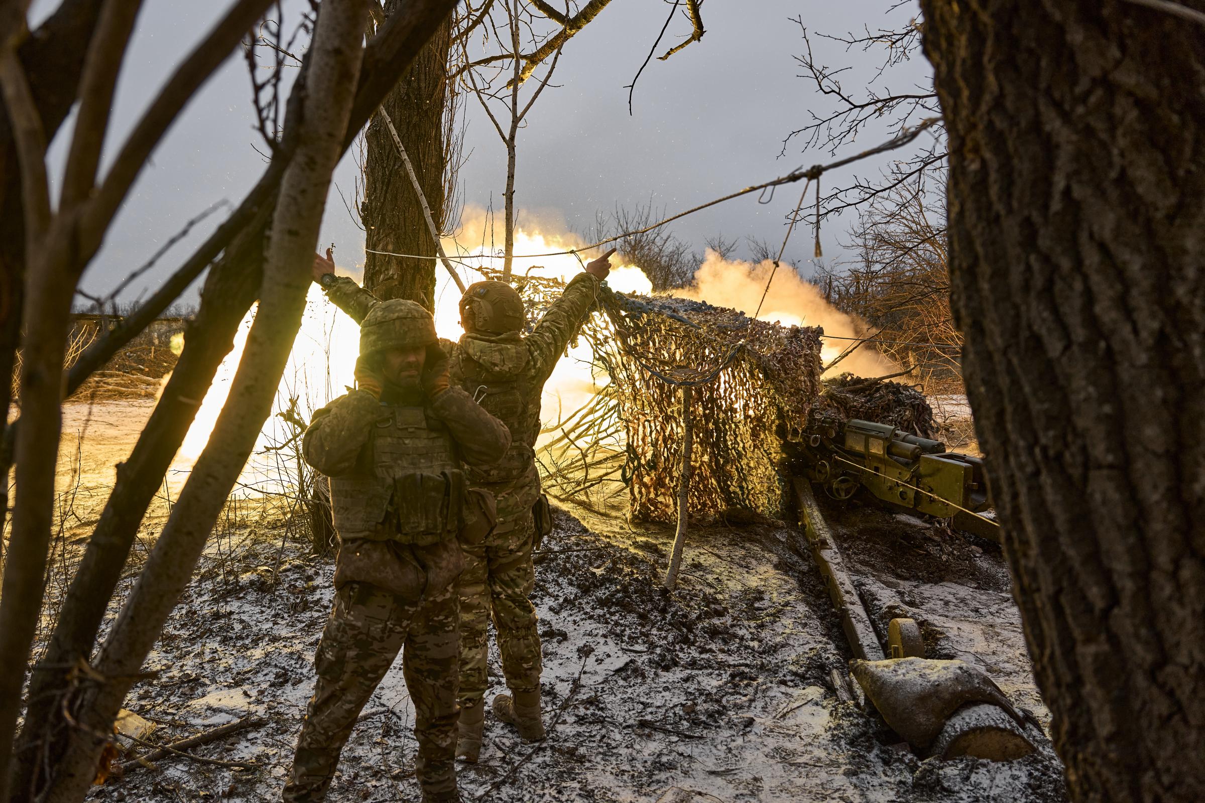 AVDIIVKA, UKRAINE - DECEMBER 7: (EDITORS NOTE: No new use of feed image after January 6, 2024. After that date, image will need to be licensed from the website.) Ukrainian military soldiers fire from the MT-12 or 2A29 gun Rapira is a Soviet