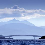 The Skye Bridge with the Cuillin mountains beyond. Picture: Colin Mearns/The Herald