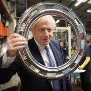 Full spin cycle? Johnson visits washing machine factory after blurting out his tax cut plan