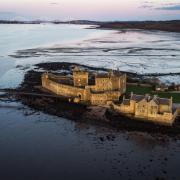 Blackness Castle, West Lothian, on the Firth of Forth at sunset. Picture date: Monday April 12, 2021. PA Photo. Photo credit should read: Jane Barlow/PA Wire.
