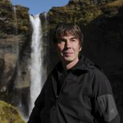 Professor Brian Cox at the Kvernufoss Waterfall in Iceland. Picture: BBC/Brian Cox/Freddie Claire
