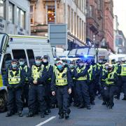 Police on Renfield Street during an Extinction Rebellion protest in Glasgow during the Cop26 summit. Picture date: Wednesday November 3, 2021. PA Photo. See PA story ENVIRONMENT Cop26 . Photo credit should read: Jane Barlow/PA Wire.