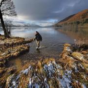 An angler stands in the River Tay on a wintry day at Kenmore, Perthshire. Picture: Jeff J Mitchell/Getty Images