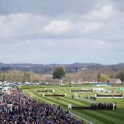 Today's Grand National will run in front of a live crowd for the first time in three years today. Picture: PA