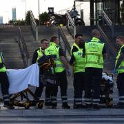 Emergency services at the Field's shopping center after a shooting, in Copenhagen, Denmark, Sunday, July 3, 2022. Danish police say several people have been shot at a Copenhagen shopping mall. Copenhagen police said that one person has been arrested