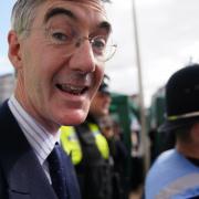 Police officers hold back members of the public as Business Secretary Jacob Rees-Mogg (centre) arrives at the Conservative Party annual conference at the International Convention Centre in Birmingham. Picture date: Sunday October 2, 2022.