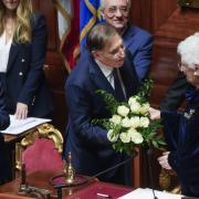 Newly elected President of the Italian Senate Ignazio La Russa presents holocaust survivor Liliana Segre with a bouquet