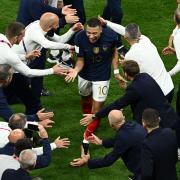 Kylian Mbappe celebrates the win over England