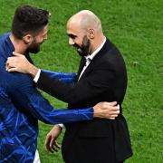 Olivier Giroud with former team-mate and Morocco manager Walid Regragui