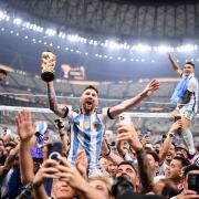 Lionel Messi leads the celebrations in Lusail