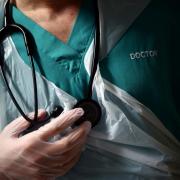 Junior doctors in Scotland have voted for three days of strike action next month