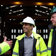 Prime Minister Rishi Sunak (second right) and Scottish Secretary Alister Jack (second left) during a visit to the Port of Cromarty Firth, Invergordon.