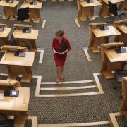 First Minister Nicola Sturgeon leaves the Holyrood chamber. File photo: Getty
