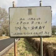 Ian MacDonald spotted this mysterious road sign, though not while he was in some exotic location, far from Scotia, where the native alphabet is strikingly different from our own. “It’s a weather-beaten sign in Inverary,” he reveals.