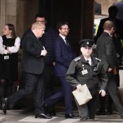 Former prime minister Boris Johnson (2nd left) leaves the Privileges Committee to vote in the House of Commons, he is giving evidence at a hearing of the Commons Privileges Committee as to whether he knowingly misled Parliament over partygate.