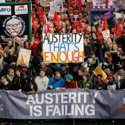 LONDON, UNITED KINGDOM - OCTOBER 20:  Demonstrators take part in a TUC march in protest against the government\'s austerity measures on October 20, 2012 in London, England. Thousands of people are taking part in the Trades Union Congress (TUC) organised