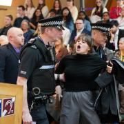 A Protester disrupts Holyrood proceedings (stock pic)