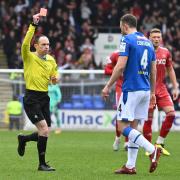 Andrew Considine was sent off a few minutes into the match on the defender's 36th birthday