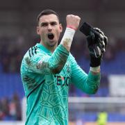 Kelle Roos was in fine form for Aberdeen at McDiarmid Park, keeping a clean sheet as the Dons racked up a fourth straight win
