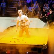 Play suspended at World Snooker Championship as table vandalised by protestor