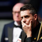 Mark Selby holds a narrow lead (Zac Goodwin/PA)